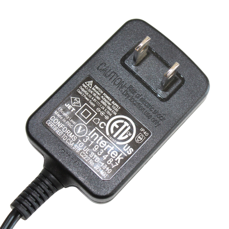 Zasilacz-ladowarka-DC-4-8V-1-2A-3-5-1-3-1030-USA-Model-1030-Photoroom.png